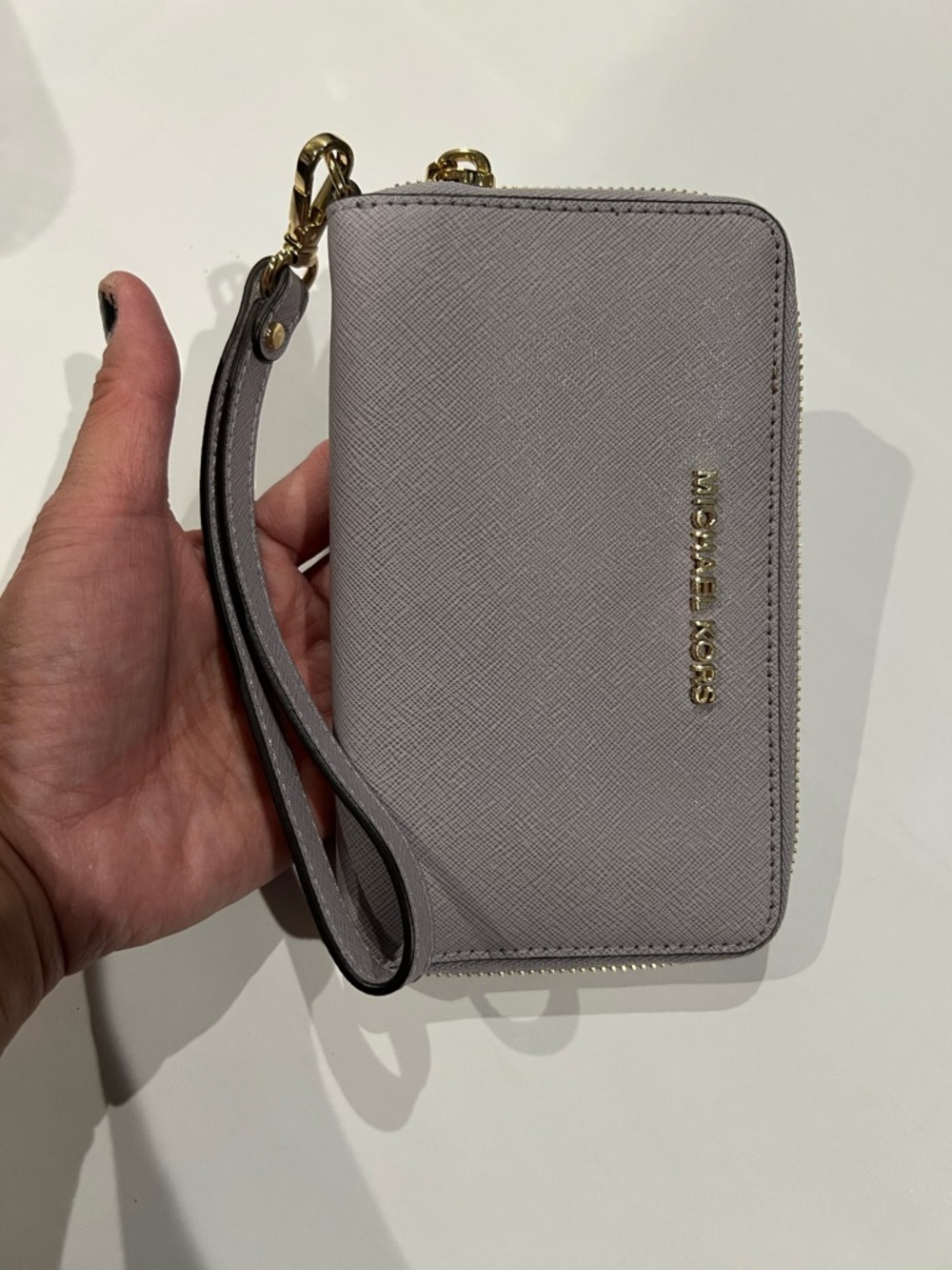 Michael Kors Light Grey Saffiano Sip around wallet & Wristlet with Gold Logo